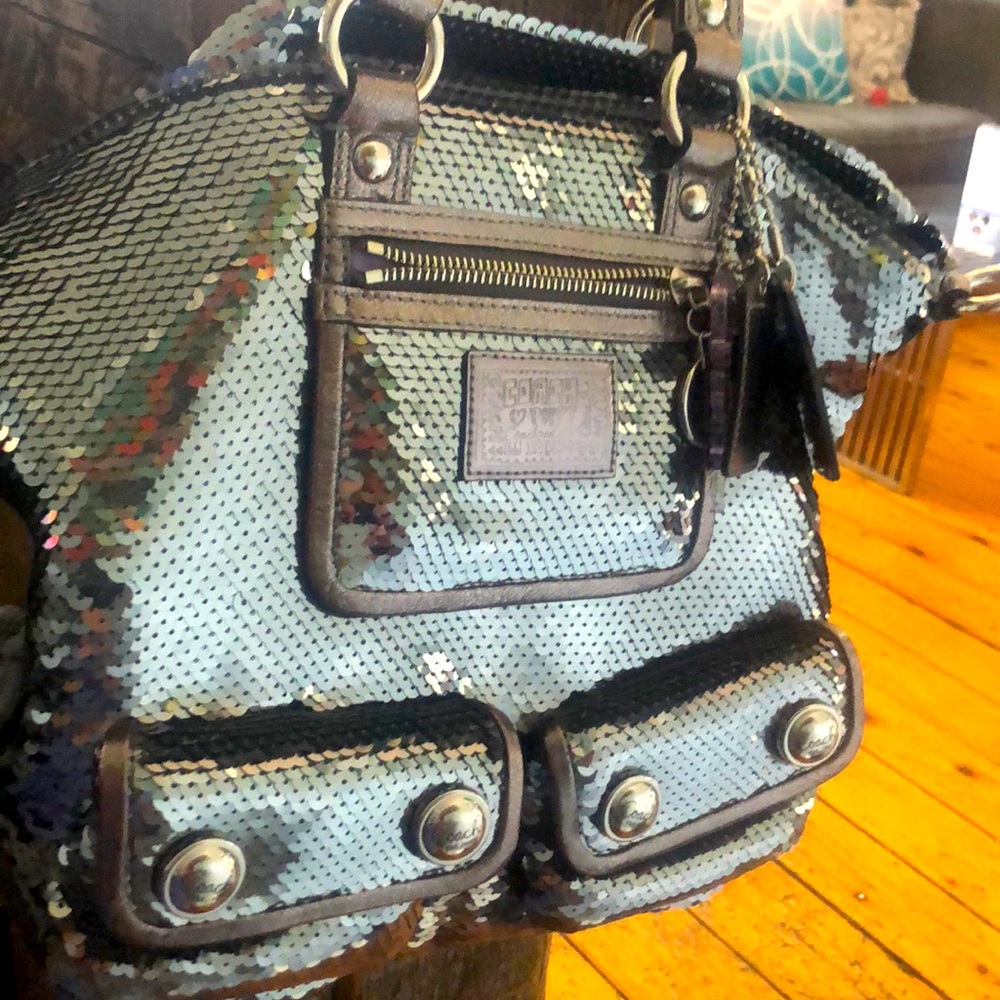 Never been used limited edition Coach silver sequin bag